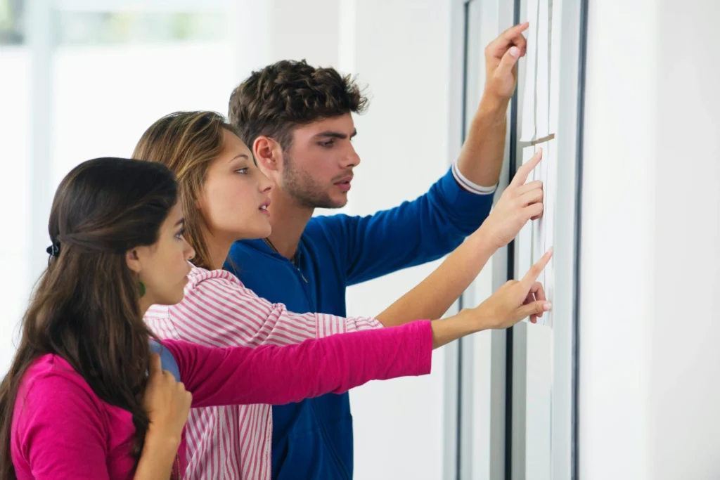 students checking on list