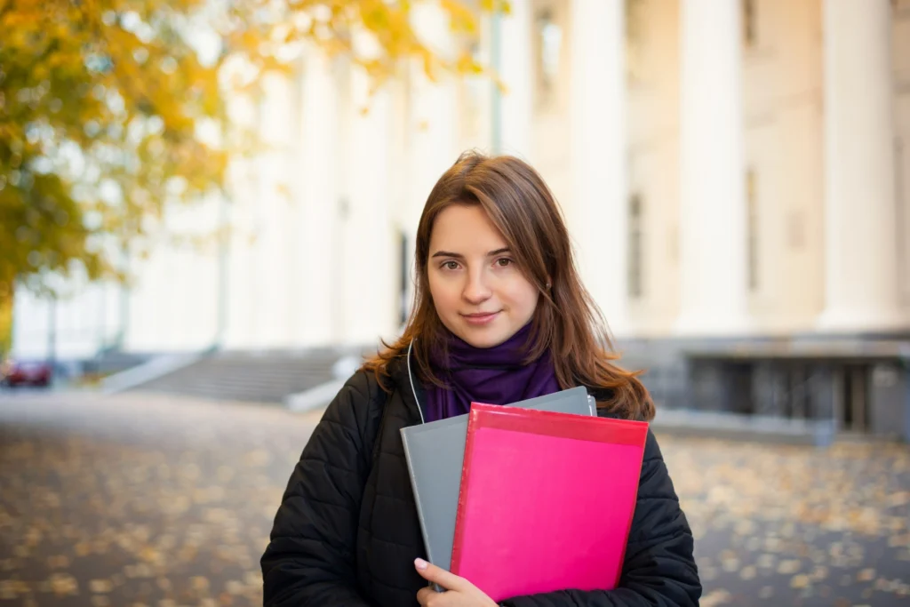 beautiful student girl with books going classes morning ready new day education