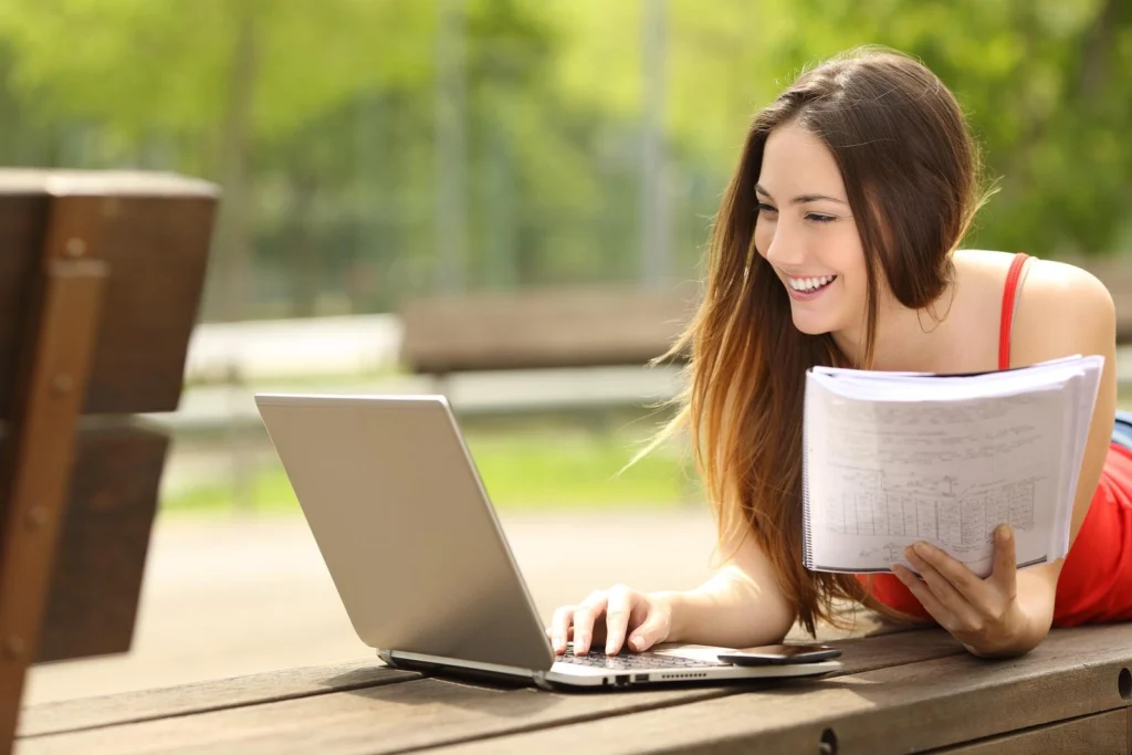 student learning with a laptop